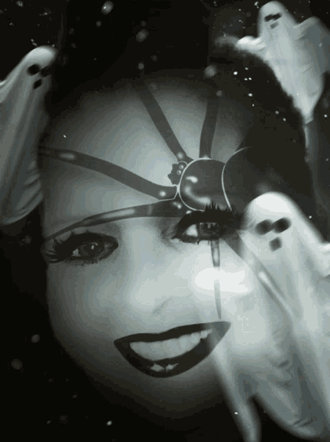a black and white photo of a woman with ghosts around her