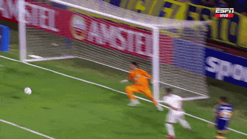 espn is broadcasting a soccer game on a soccer field