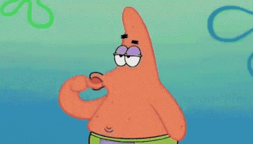 patrick star from spongebob squarepants is holding a red object in his mouth