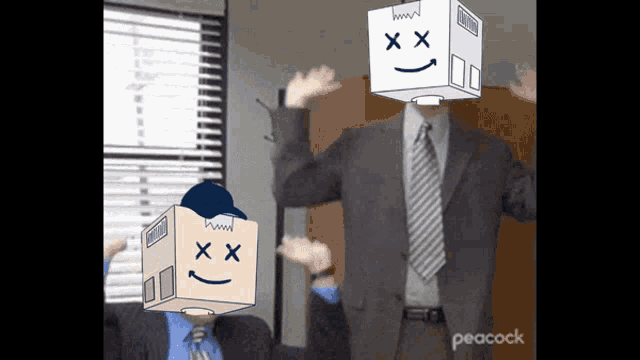 a man in a suit has a box on his head that says peacock on it