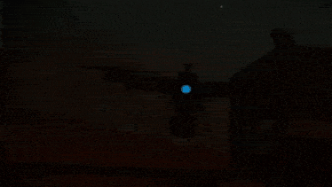 a fireball is coming out of a hole in the ground
