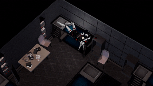 a person laying on a bed in a dark room with a desk and chairs