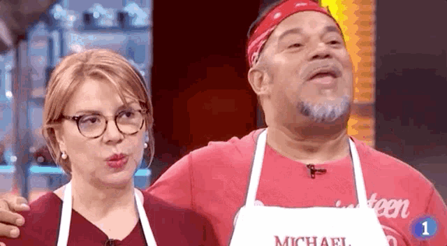 a man wearing an apron that says michael on it