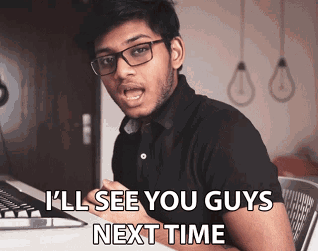 a man with glasses and a black shirt says i 'll see you guys next time