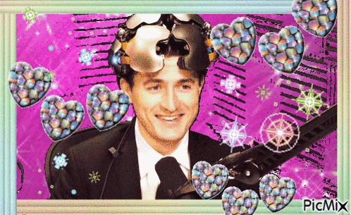 a picture of a man in a suit and tie is surrounded by hearts and a picmix logo