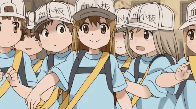 a group of cartoon characters wearing white hats with chinese writing on them