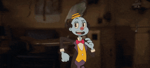 a cartoon character in a tuxedo and bow tie is pointing at the camera .