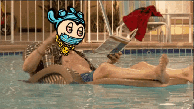 a man reading a book in a pool with a cartoon character on his head