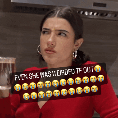 a woman in a red sweater holds a glass of water with a caption that says even she was weirded tf