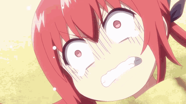 a close up of a girl 's face with a surprised look on her face
