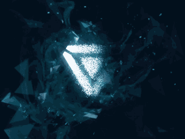 a glowing triangle with the letter v on it