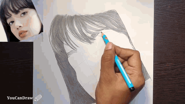 a person is drawing a woman 's face with a blue pencil and the words " youcandraw " on the bottom