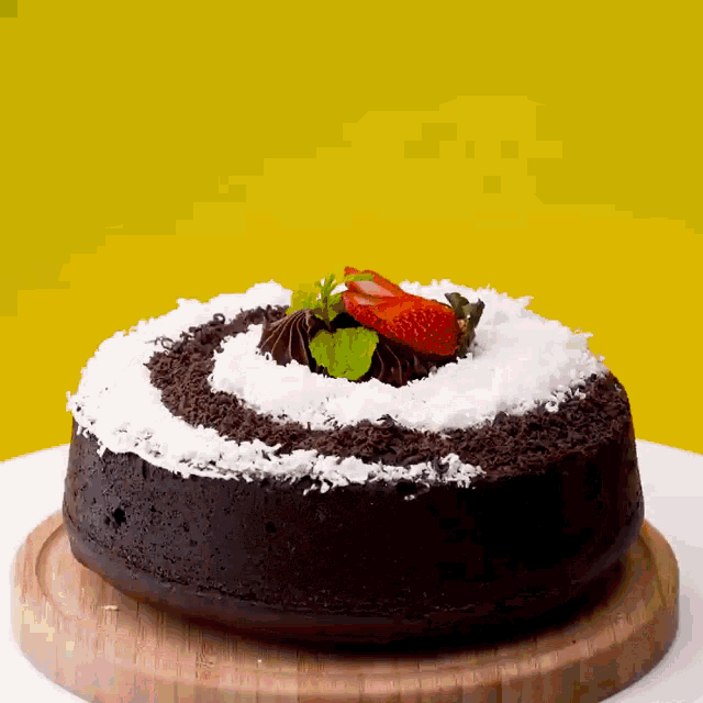a chocolate cake with a strawberry on top
