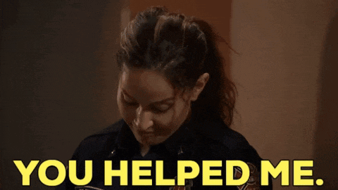a woman in a police uniform is making a face and saying `` you helped me . ''