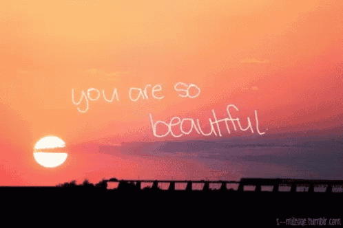 a picture of a sunset with the words " you are so beautiful " written in the sky