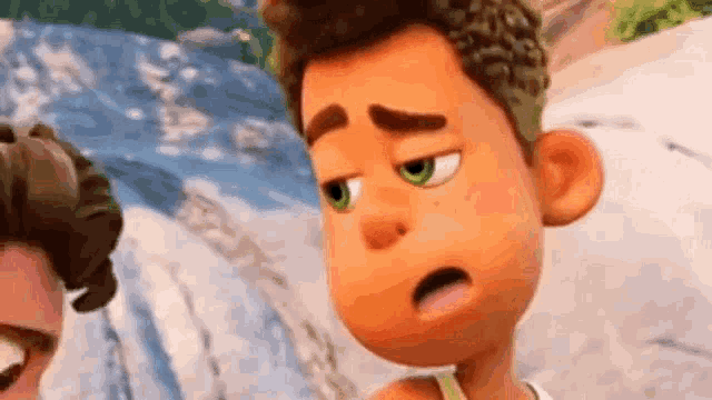 a close up of a cartoon boy with green eyes making a sad face .