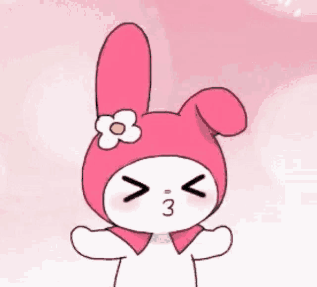 a drawing of a pink bunny with a flower on its head and the number 3 on its face .