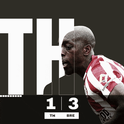 a man in a red and white jersey with the number 13 behind him