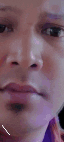 a close up of a man 's face with the letter a on the bottom