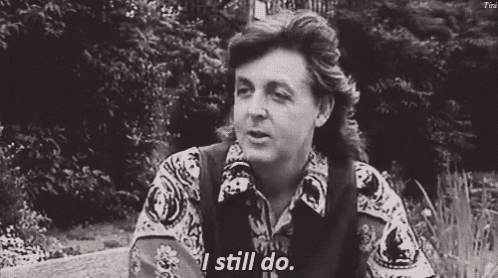 a black and white photo of a man with the words " i still do " on the bottom