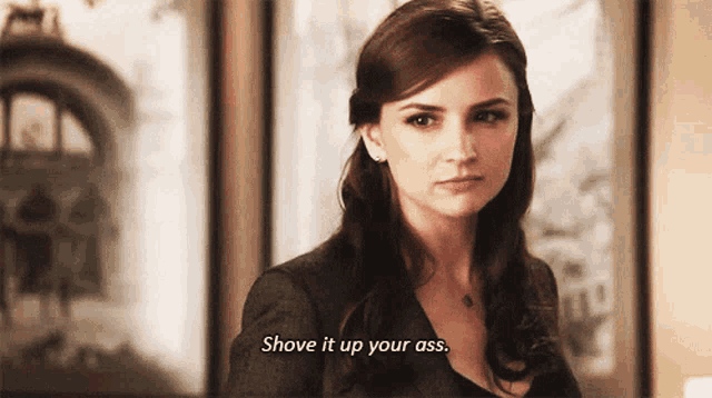 a woman says shove it up your ass while looking at the camera
