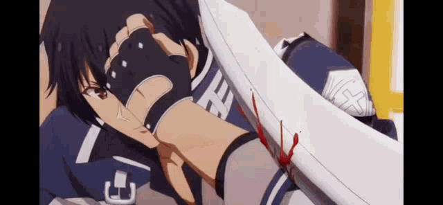 a man is laying on a bed with a sword in his hand and blood coming out of it .