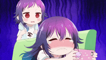 a girl with purple hair is crying while another girl looks at her