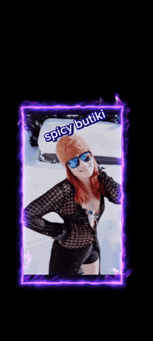 a picture of a woman wearing sunglasses and a hat with spicy butiki written on it
