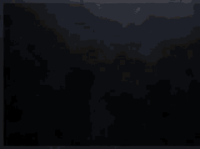 a large rock is being smashed into pieces by a light