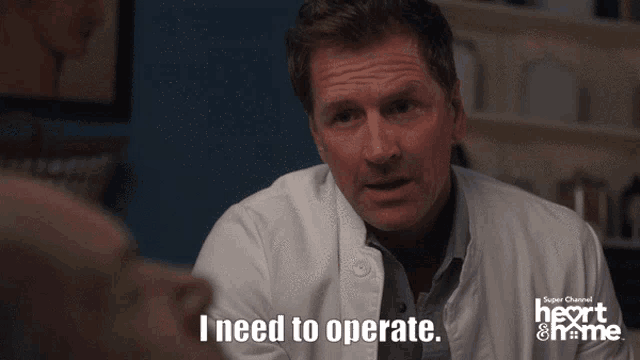a man in a white lab coat says i need to operate