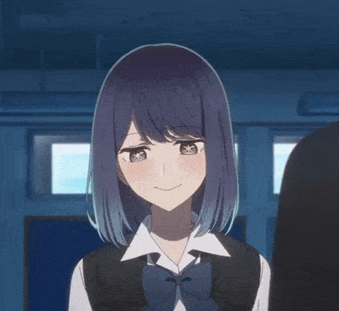 a girl with blue hair is smiling and wearing a blue bow tie
