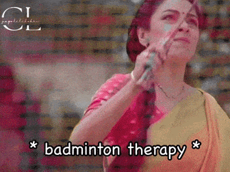 a woman holding a badminton racket with the words badminton therapy written below her
