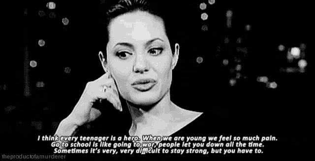 a woman is talking on a cell phone in a black and white photo with a quote .