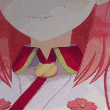 a close up of a girl 's neck with red hair and a gold pendant