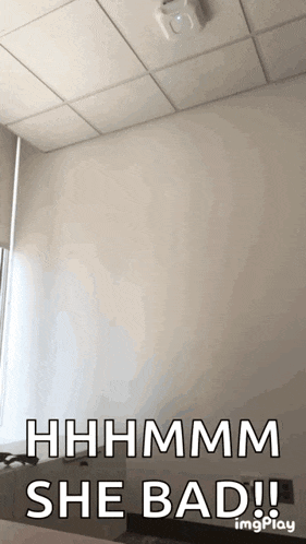 a gif that says hhhmm she bad on it