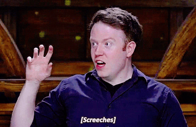 a man in a blue shirt says ' screeches ' at the bottom of his mouth
