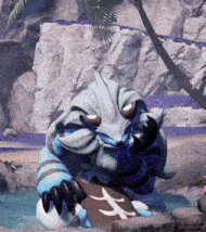 a cartoon monster is standing in a pool of water with a chinese symbol on a rock .