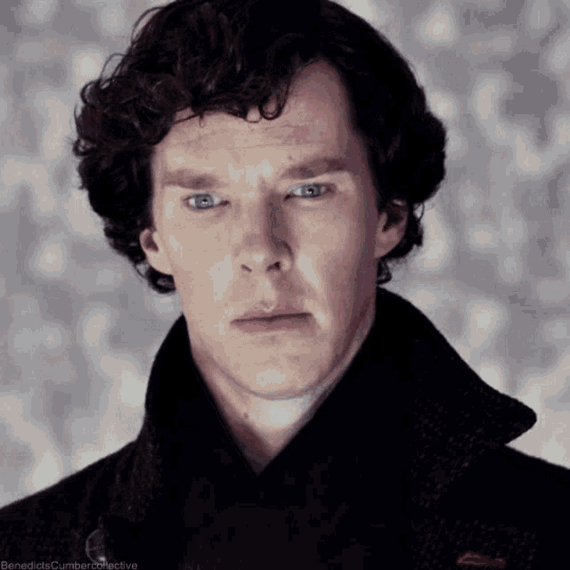 a close up of a man 's face with benedict cumber collective written in the corner