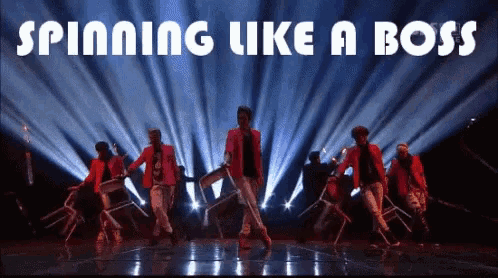 a group of men are dancing on a stage and the words spinning like a boss are above them