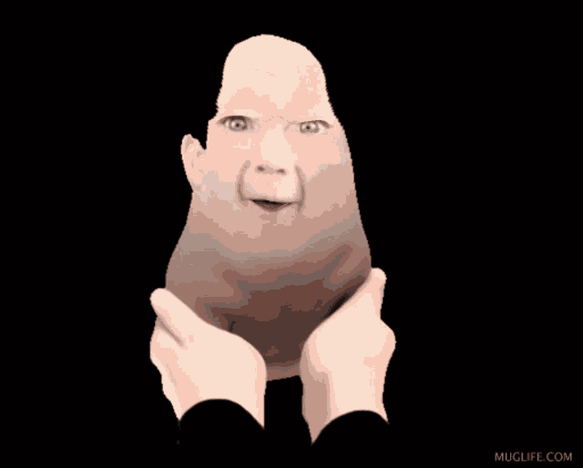 a cartoon of a baby 's face with a black background and muglife.com in the lower right corner