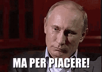 a man in a suit with the words ma per piacere written on his face