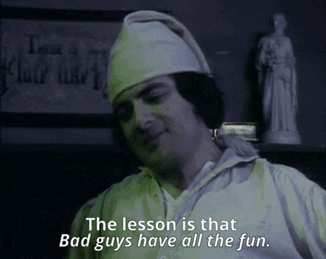 a man says the lesson is that bad guys have all the fun in front of a statue