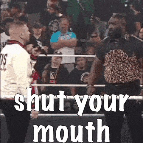 two men in a boxing ring with the words shut your mouth