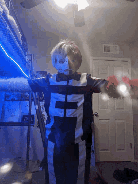 a person wearing a costume with the letter g on the front