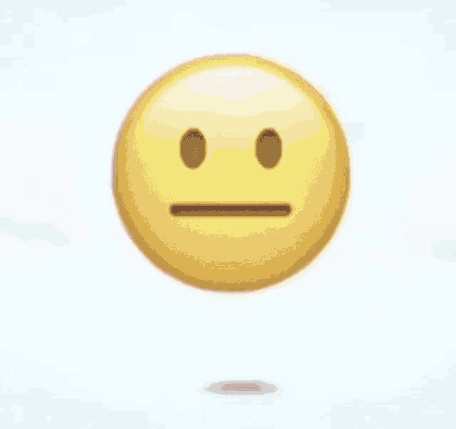 a yellow smiley face with its mouth open is floating in the air on a blue background .