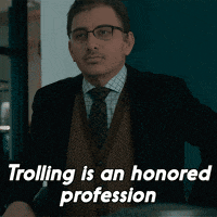 a man in a suit and tie with the words trolling is an honored profession below him
