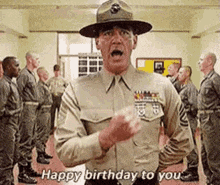 a man in a military uniform is saying happy birthday to you .