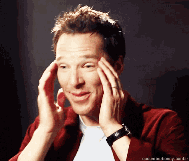 a man covering his face with his hands with the words cucumberbenny.tumblr written below him