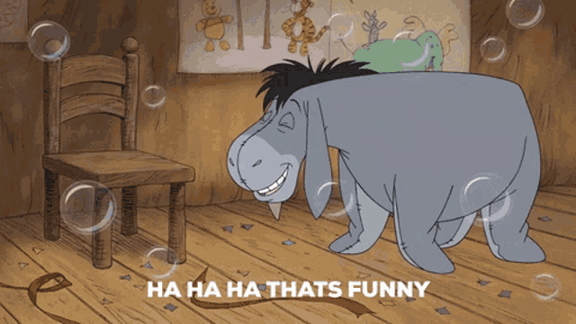 eeyore from winnie the pooh is laughing in a cartoon