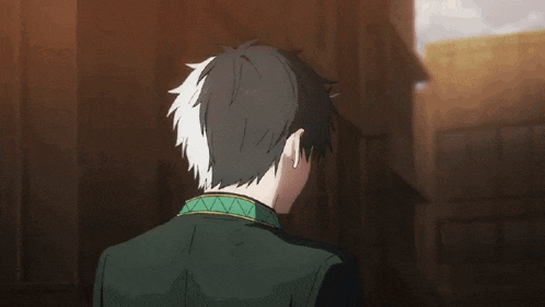 a man with white hair and a green jacket is standing in front of a wall .